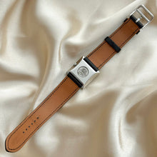 Load image into Gallery viewer, VINTAGE HERMÈS HIDDEN DIAL BLACK LEATHER WATCH