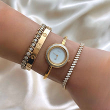 Load image into Gallery viewer, VINTAGE GUCCI PLAY BEZEL WATCH (12 BEZELS W/ DIAMOND CUT)