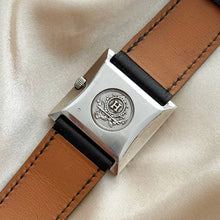 Load image into Gallery viewer, VINTAGE HERMÈS HIDDEN DIAL BLACK LEATHER WATCH