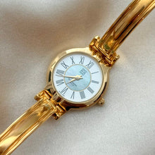 Load image into Gallery viewer, VINTAGE GIVENCHY SEA GREEN MOTHER-OF-PEARL WATCH