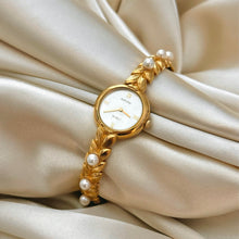 Load image into Gallery viewer, VINTAGE WAKO RAFFINÉE MOTHER-OF-PEARL WATCH