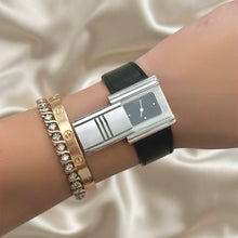 Load image into Gallery viewer, VINTAGE HERMÈS HIDDEN DIAL BLACK LEATHER WATCH