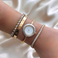 Load image into Gallery viewer, VINTAGE GUCCI PLAY BEZEL WATCH (12 BEZELS W/ DIAMOND CUT)