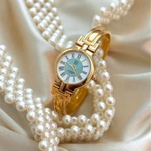 Load image into Gallery viewer, VINTAGE GIVENCHY SEA GREEN MOTHER-OF-PEARL WATCH