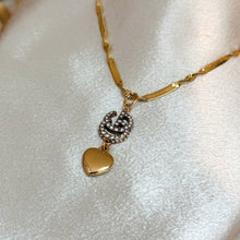 Load image into Gallery viewer, GG DANGLING HEART NECKLACE