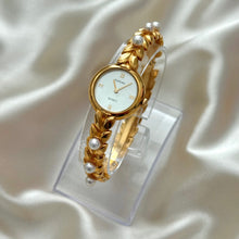 Load image into Gallery viewer, VINTAGE WAKO RAFFINÉE MOTHER-OF-PEARL WATCH
