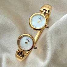 Load image into Gallery viewer, VINTAGE FENDI MOTHER-OF-PEARL CUFF WATCH
