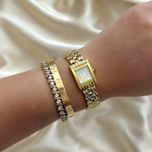 Load image into Gallery viewer, VINTAGE GIVENCHY MOTHER-OF-PEARL DAINTY WATCH
