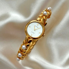 Load image into Gallery viewer, VINTAGE WAKO RAFFINÉE MOTHER-OF-PEARL WATCH
