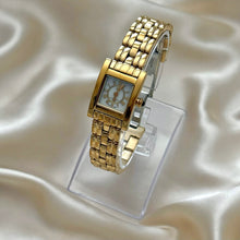 Load image into Gallery viewer, VINTAGE GIVENCHY MOTHER-OF-PEARL DAINTY WATCH
