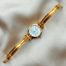 Load image into Gallery viewer, VINTAGE GIVENCHY SEA GREEN MOTHER-OF-PEARL WATCH
