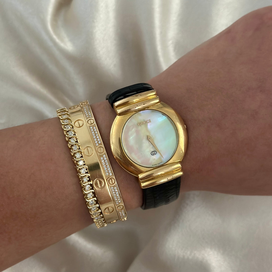 VINTAGE GUCCI MOTHER-OF-PEARL BLACK LEATHER WATCH