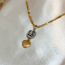 Load image into Gallery viewer, GG DANGLING HEART NECKLACE

